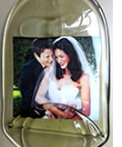 Preserve your memories with a personalized glass cheese board using your own photo or invitation